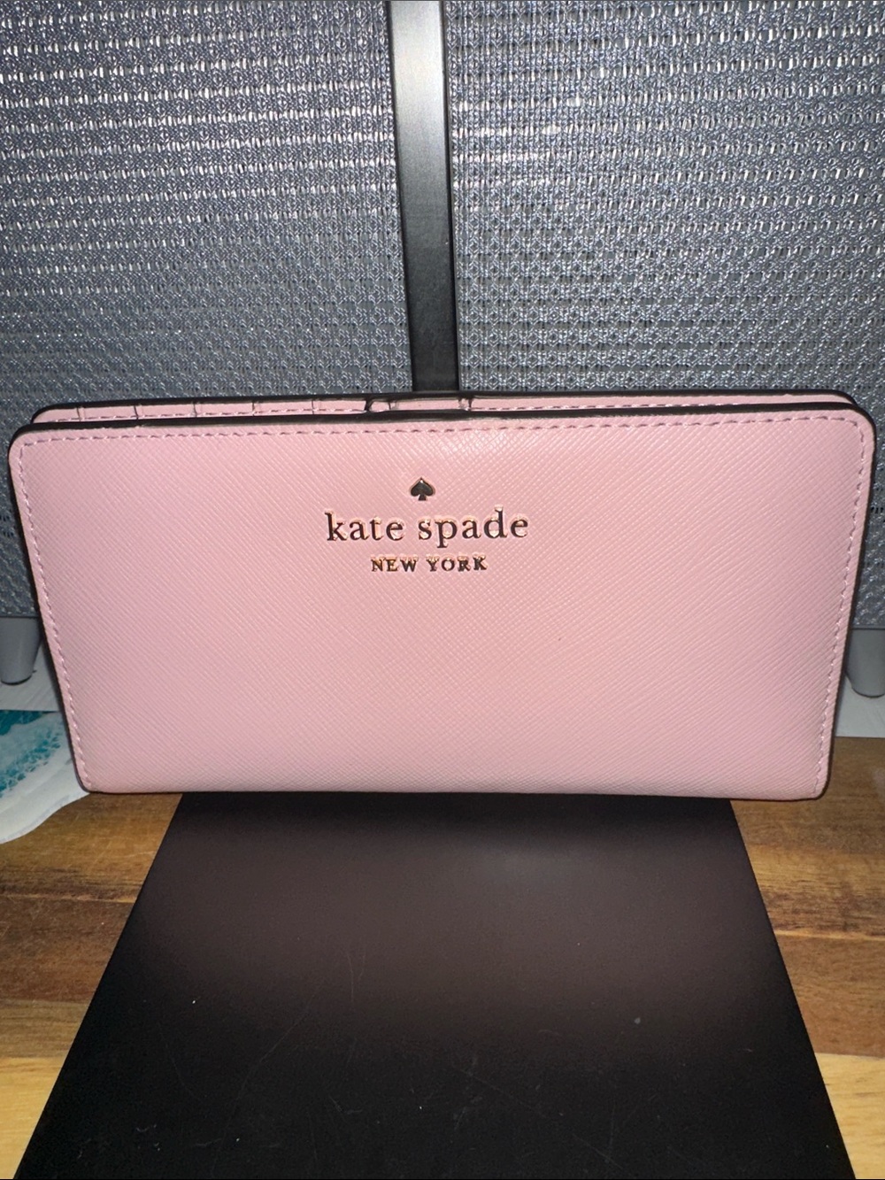 kate spade pink saffiano zip-around continental wallet with gold logo